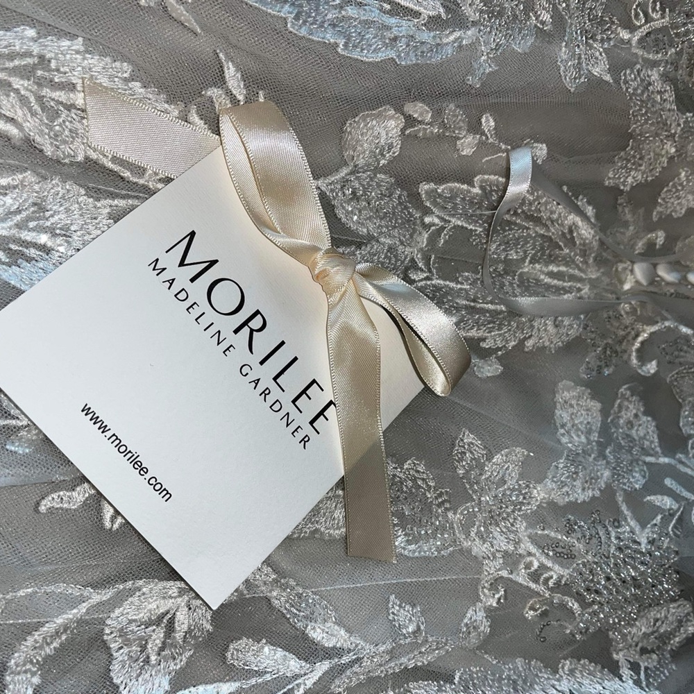 Morilee wedding dress, size 8 Never altered.  PERFECT CONDITION…. NEVER WORN…